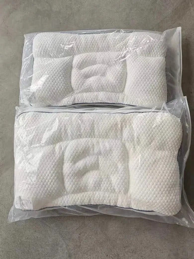 Two Hushly Kids pillows still in their bags, just delivered