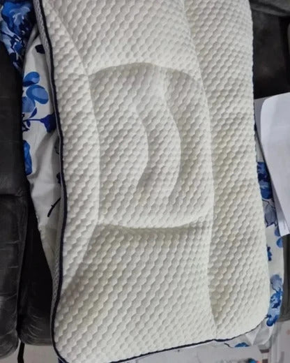 Close-up of the Hushly Kids pillow's quilted cover and contoured centre
